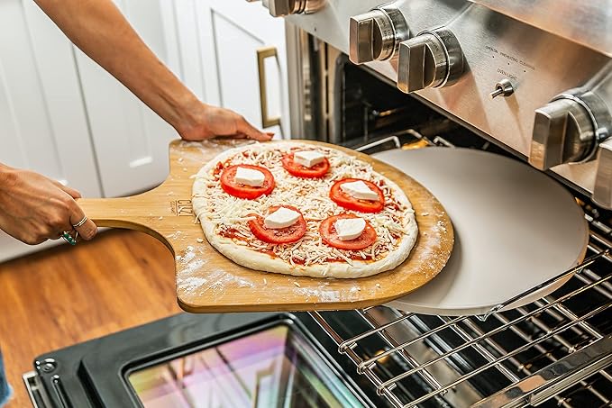 Cuzi Gourmet XL 4-Piece Pizza Stone Set - 15" Thermal Shock Resistant Cordierite Baking Stone, 22" Natural Bamboo Peel & Cutter Rocker - Large Stone for Grill and Oven