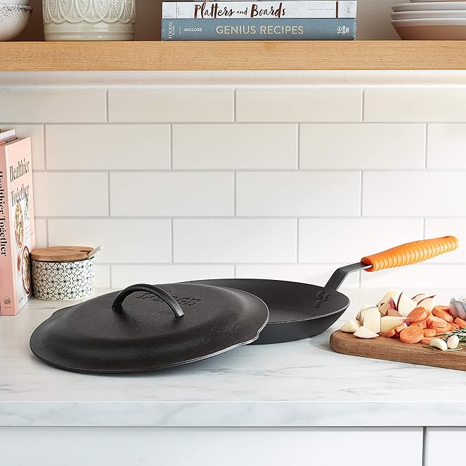 Lodge 12 Inch Cast Iron Lid. Classic 12-Inch Cast Iron Cover Lid with Handle and Interior Basting Tips.
